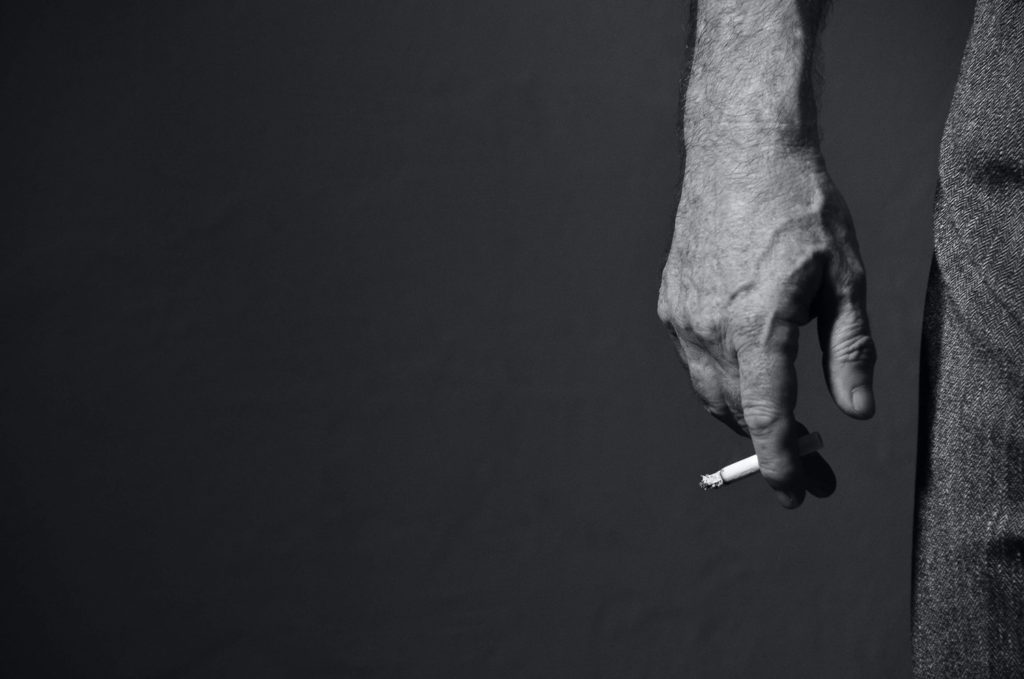 Man holding a cigarette